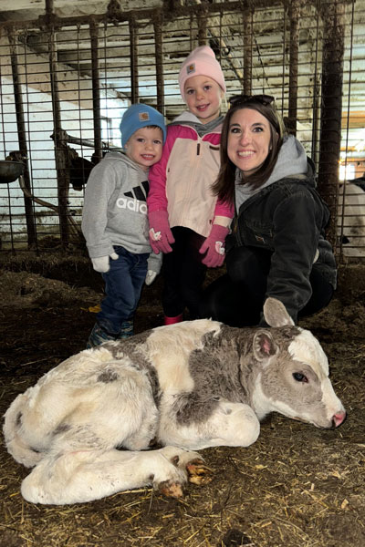 400x600-cindy-with-Cow Cindy with her kids and calf